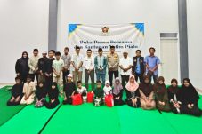 Kegiatan buka puasa bersama dan santunan anak yatim yang digelar PWI Kota Tangerang Selatan di Gedung Layanan Informasi Tangsel pada Ramadan 2026.